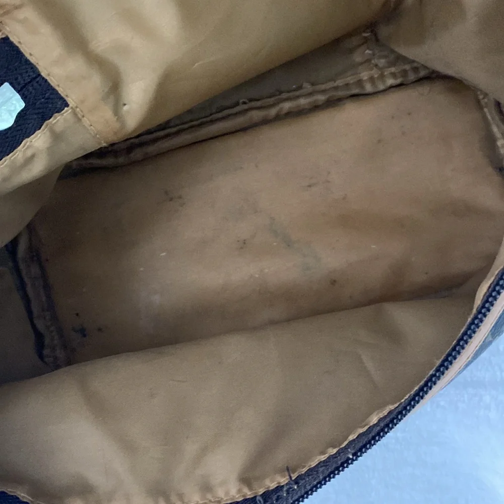 Dark brown royal-themed cosmetics bag